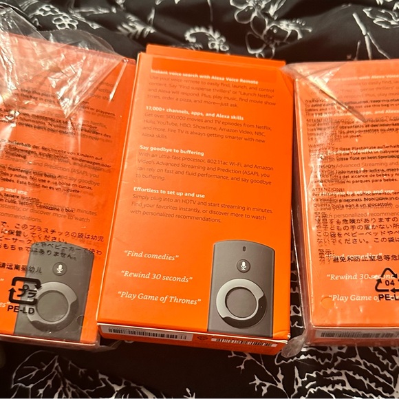 Amazon Fire TV Stick with Alexa Voice Remote - Orange and Black - Picture 2 of 2